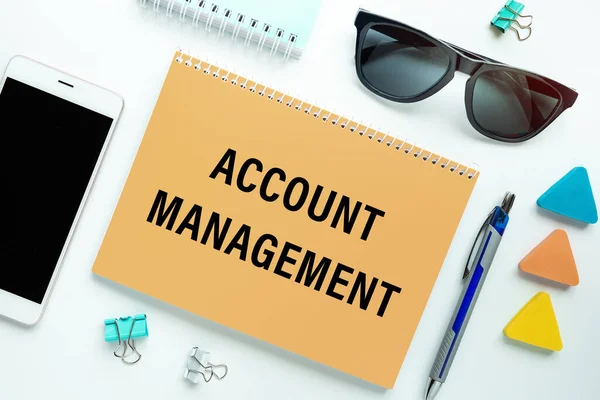 Account management notepad on office desk